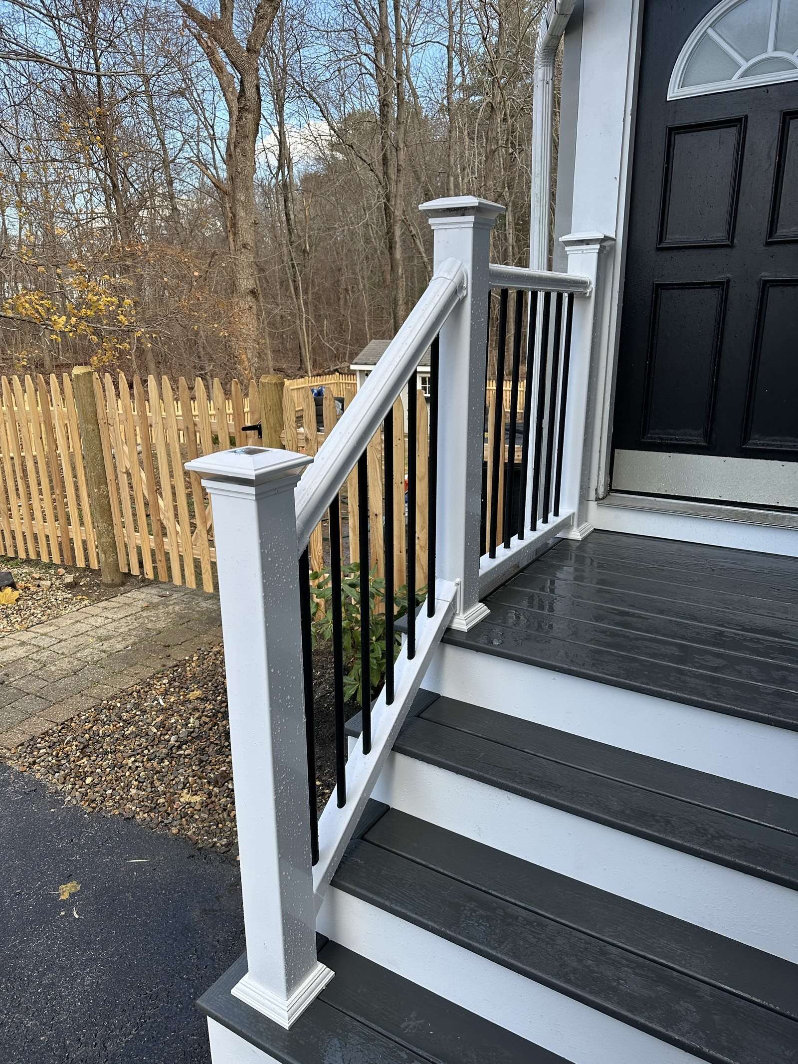 Composite entry steps with white railing and black balusters, Reading